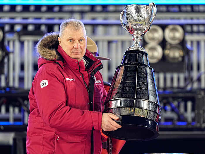 Dec 12, 2021; Hamilton, Ontario, CAN; Canadian Football League commissioner Randy Ambrosie goes to present the Grey Cup to the Winnipeg Blue Bombers after a win over the Hamilton Tiger-Cats in the 108th Grey Cup football game at Tim Hortons Field. Mandatory Credit: John E. Sokolowski-USA TODAY Sports